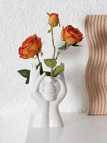 这款创意桌面收纳盒为一体式设计，采用塑料材质，不可盛水。它造型独特，功能多样，可用作笔筒、化妆刷收纳盒、装饰品、摆件或花盆。 - 白色 - 查看 3