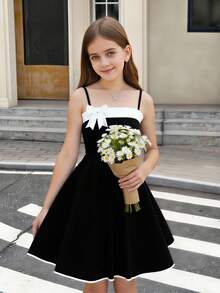 这款优雅时尚的夏季女童连衣裙采用经典的黑白撞色设计，肩带饰有蝴蝶结。适合度假、情人节、生日、派对、日常户外旅行等场合，也是送给孩子的绝佳礼物。 - 黑色 - 查看 6