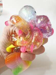 1/5 món đồ chơi bóp mềm hình cá vàng bóng, đồ chơi giảm căng thẳng dễ thương, đồ chơi cầm tay giúp giảm áp lực, phù hợp cho người tự kỷ, nhân viên văn phòng, học sinh, quà tặng ngày lễ lý tưởng, quà tặng vui nhộn dễ thương, phù hợp cho cả bé trai và bé gái, đồ nhét túi quà dự tiệc, quà Giáng sinh, đồ chơi giảm căng thẳng, quà tặng cho trẻ em trong các bữa tiệc. - Nhiều màu - Xem 5