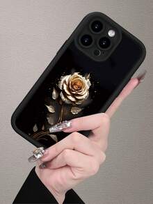黑色背景上的金色玫瑰图案，兼容苹果 17、16、15、14、13、12、11、XS、XR、X、7、8 Mini、Plus、Pro、Max、SE 及相关系列。采用 TPU 材质，提供有效保护，简约设计，男女皆宜。 - 黑色 - 查看 2