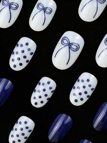 24 piezas. Pegatinas de uñas con forma ovalada. Estilo dulce. Lunares azules con lazo. Adecuado para todas las estaciones (primavera, verano, otoño, invierno). Decoración de uñas ligera, producto de cuidado de uñas DIY. Adecuado para uso diario de niñas/mujeres. Adecuado para ocasiones como citas, vida diaria, fiestas, vuelta al colegio, etc. Juego de uñas: ¡para decorar las uñas y hacer arte de uñas DIY!