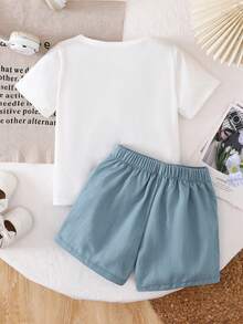 Bộ đồ hè 2 món cho bé gái 4-7 tuổi: áo thun trắng và quần váy denim xanh, trang trí nơ xinh xắn đính đá, phong cách châu Âu ngọt ngào, chất liệu co giãn thoải mái, bộ sưu tập mới năm 2026. - Màu xanh lam - Xem 3