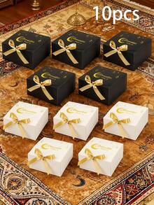 10个精美斋月主题纸质礼盒，饰有金色丝带蝴蝶结 - 黑白混合风格，精致的月亮和星星图案设计，结构坚固耐用，非常适合作为节日礼物、派对礼物、庆祝活动和交换礼物，以及日常分享。 - 彩色 - 查看 1
