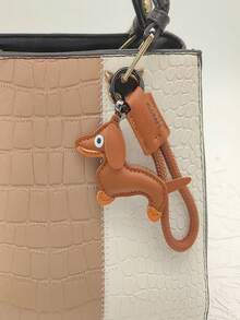 1个迷你卡通腊肠犬钥匙扣挂件，PU材质，可爱腊肠犬造型，可作腕带、车钥匙链、背包装饰、动物背包挂饰、狗狗配饰，适合母亲节、父亲节、情人节等节日作为装饰挂件小礼物 - 彩色 - 查看 5