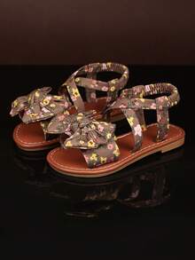 1双印花鞋头平底凉鞋，蝴蝶结装饰，交叉踝带，柔软鞋垫，简约圆头设计，防滑，轻便，可爱罗马沙滩凉鞋，适合3-15岁女孩，适合上学、海滩、日常休闲、春夏穿着。 - 棕色 - 查看 7