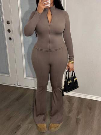 LovelyWholesale Plus Size Women'S Casual Solid Color Stand Up Collar Long Sleeved Zipper Jacket And Flared Pants For Spring