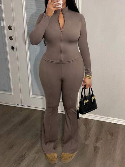 LovelyWholesale Plus Size Women'S Casual Solid Color Stand Up Collar Long Sleeved Zipper Jacket And Flared Pants For Spring