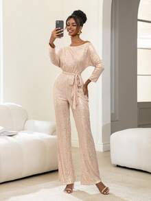 Faeriesty Bộ jumpsuit dài tay bất đối xứng độc đáo này có thiết kế đính sequin lấp lánh, kết hợp với thắt lưng nơ bằng satin và kiểu dáng ống rộng, là lựa chọn lý tưởng cho các sự kiện theo chủ đề vũ trường, dạ tiệc thảm đỏ, tiệc thời trang và lễ kỷ niệm Ngày Valentine. - Rượu sâm banh - Xem 5