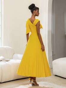 Faeriesty Đầm dạ hội dài thướt tha, sang trọng với điểm nhấn nơ xếp nếp, thân áo ôm sát và chân váy xếp ly rộng bồng bềnh – Lý tưởng cho đám cưới, tiệc gala, lễ trao giải và tiệc chiêu đãi trang trọng, trang phục đón năm mới, ngày Valentine và các bữa tiệc khác. - Màu vàng - Xem 2