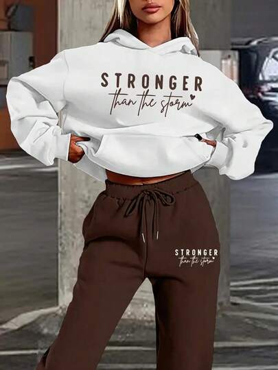 Looking For An Outfit That's Laid-Back Yet Full Of Empowering Charm? This Slogan Set Collection Is Your Perfect Pick! Soft Hues Like Brown, Light Blue, And Green Bring A Cozy Vibe, While The Hoodie Design Wraps You In Casual Ease. The "STRONGER Than The Storm" Slogan Quietly Carries A Sense Of Confidence. The Relaxed Fit Flatters All Body Types-Pair It With Sneakers For A Fresh Street Look, Or Slip On Slippers For Cozy At-Home Style Without Losing Polish. No Need To Mix And Match; Slipping On The Set Lets You Easily Capture The Comfort And Warmth Of An American Girl's Vibe, Keeping Every Day Stylish And Delightfully Empowering.