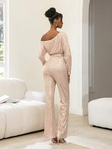 Faeriesty Bộ jumpsuit dài tay bất đối xứng độc đáo này có thiết kế đính sequin lấp lánh, kết hợp với thắt lưng nơ bằng satin và kiểu dáng ống rộng, là lựa chọn lý tưởng cho các sự kiện theo chủ đề vũ trường, dạ tiệc thảm đỏ, tiệc thời trang và lễ kỷ niệm Ngày Valentine. - Rượu sâm banh - Xem 2
