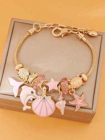 一套粉色海洋风浪漫珐琅首饰，不锈钢吊坠手链，饰有鱼尾、海豚、贝壳、海星、海龟元素，复古金色时尚配饰，适合作为情人节、圣诞节礼物