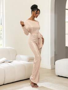 Faeriesty Bộ jumpsuit dài tay bất đối xứng độc đáo này có thiết kế đính sequin lấp lánh, kết hợp với thắt lưng nơ bằng satin và kiểu dáng ống rộng, là lựa chọn lý tưởng cho các sự kiện theo chủ đề vũ trường, dạ tiệc thảm đỏ, tiệc thời trang và lễ kỷ niệm Ngày Valentine. - Rượu sâm banh - Xem 8