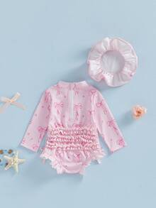 Conjunto de Traje de Baño con Protección Solar para Niña Pequeña con Estampado de Lazo, Manga Larga, Cuello Redondo, Mono con Volantes y Conjunto de Sombrero para Piscina y Playa - Rosa - Ver 2