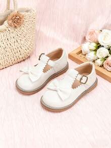 A Pair Of White Shoes With T-Strap,Metal Buckle,Bow - Leather Shoes,Oxford Shoes,Loafer Shoes,Flat Shoes Kids Shoes,Shoes,Girls Shoes,Girl Shoes,Zapatos De Niña,Toddler Girl Shoes,Kid Shoes,Zapatos Para Niñas,Shoes For Girls,Zapatos De Niño,Zapatos,Zapatos Para Niña,Kids,Shoes Kids,Zapatos De Niñas,Zapatos Para Niños,Little Girl Shoes,Zapatos Niña,Zapatos De Niños,Girls Dress Shoes,Girls,Flats,Zapatos Niñas,Toddler Girl,Shoes Girls,Loafers For Toddler & Little Girls & Little Boys | Ideal For School Day,Field Trip,After-School Playdate,Birthday Party,Family Brunch,Picnic,Church Service,Holiday Gathering,Art Class,Library Visit,Park Stroll,Weddings,Outings,Special Occasions,Christmas,New Year Celebrations - 5305 Trắng - Xem 5