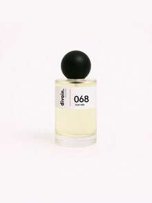 Perfume divain.068 - Descubre la audacia frutal y amaderada para mujeres de carácter, con notas de higos frescos y un toque de caviar. Ideal para días de verano, su intensidad duradera desafía convenciones y subraya tu singularidad. Equivalente a Womanity de Thierry Mugler. - divain.068 - Ver 1