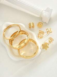 Set de 9 piezas de pulseras tipo brazalete vintage de oro grueso, con dijes de estrella de mar, girasol, perlas falsas, conchas falsas y anillos geométricos bohemios, adecuado para mujeres en vacaciones, citas, fiestas y uso diario - Amarillo Oro - Ver 6