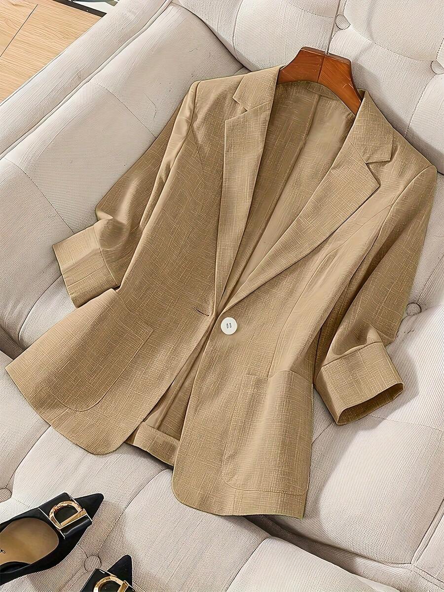 Sleek Single-Button Blazer - Cropped Sleeve Office & Casual Jacket   Tailored Slim-Fit Blazer - Versatile Neutral & Pastel Hue Options   Chic Cropped Sleeve Blazer - Polished One-Button Workwear Essential   Chic Tailored Blazer - Cropped Sleeve Single-Button Jacket (Beige/Blue/Pink) - Màu Khaki - Xem 1