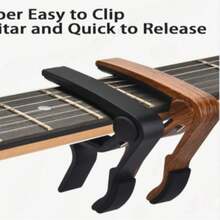 提升你的吉他演奏水平！这款优质变调夹可以增强你的吉他演奏表现力——适用于原声吉他、电吉他和贝斯！使用这款两件套高品质变调夹——适用于原声吉他、电吉他和贝斯，释放你的音乐才华！ - 黑色 - 查看 6
