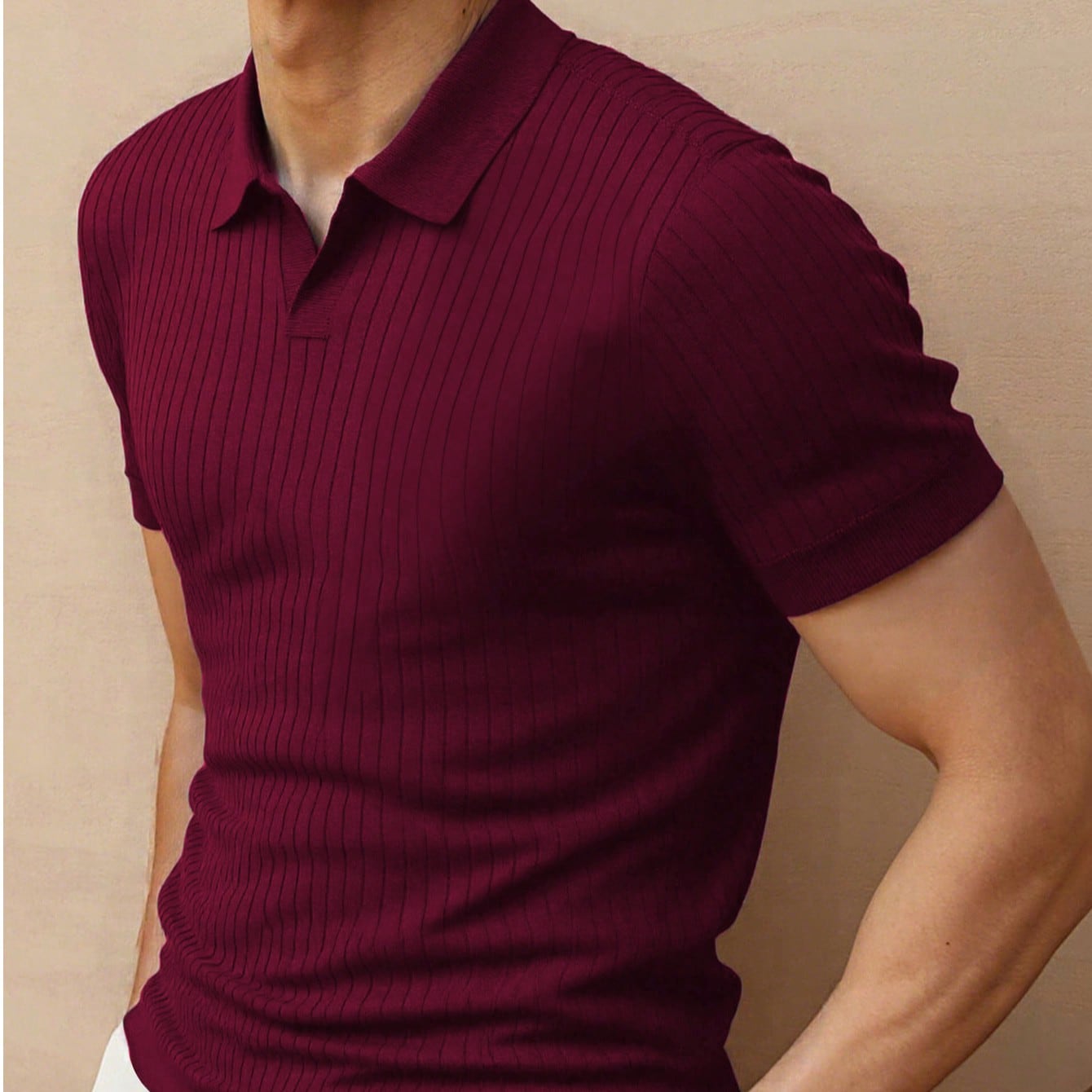 Polo de manga corta de punto acanalado de unicolor y ajuste holgado para hombre
