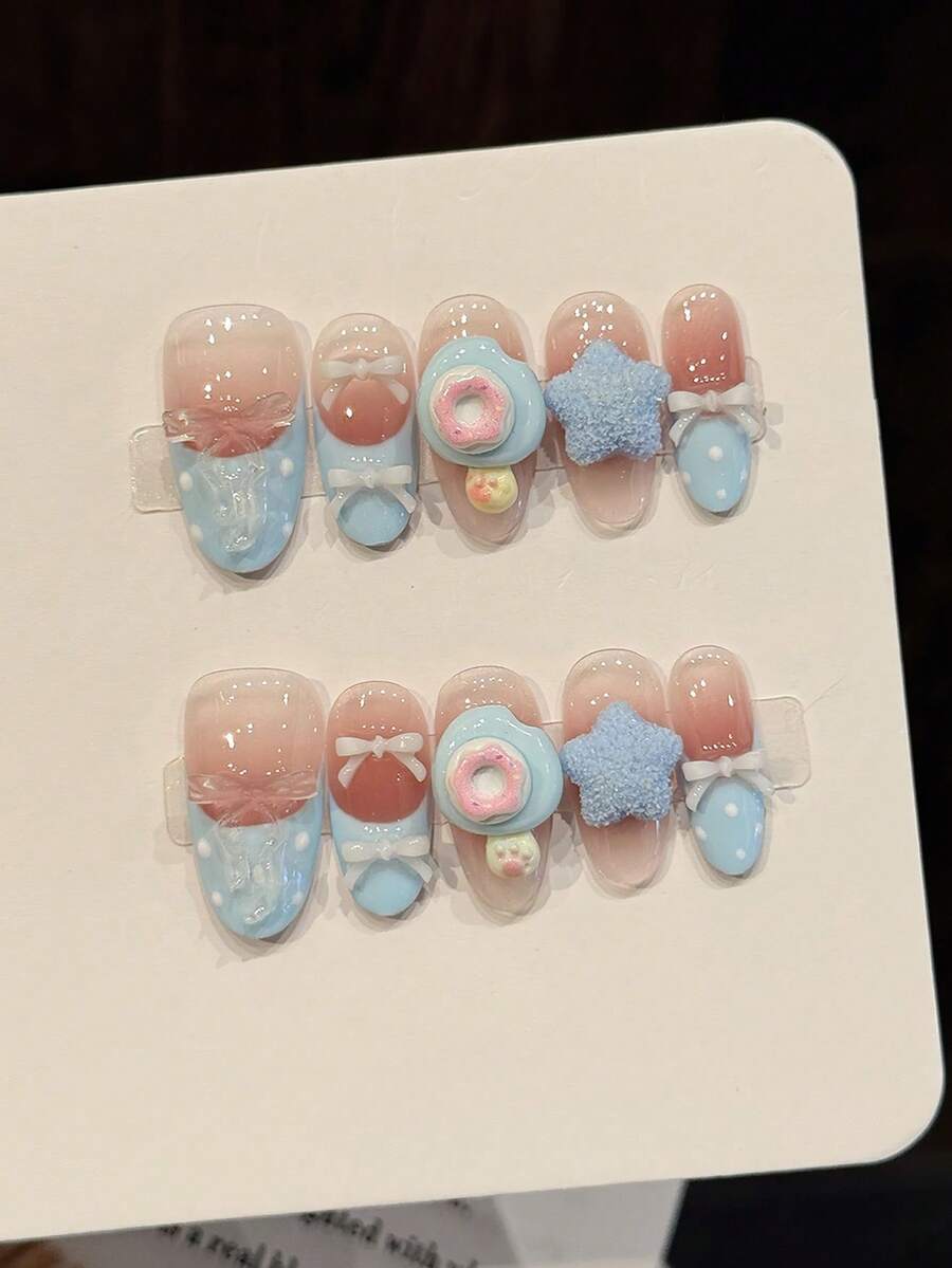 10片粉蓝渐变3D甜甜圈星星蝴蝶结手工亚克力美甲贴片，日系甜美可爱波点法式假指甲，短款椭圆法式甲片，DIY美甲用品，可重复使用，含果冻胶和指甲锉，适合日常佩戴、情人节、派对等场合 - 淺藍色 - 查看 1