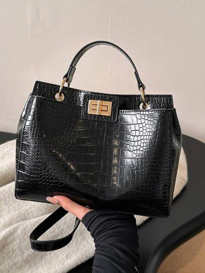 时尚复古欧式双面手提包，女士款，可定制印花设计，耐刮材质，是节日送礼的理想之选，也适合中年妈妈使用。大容量设计满足日常通勤和购物需求，可单肩背或斜挎，是一款实用通勤包。