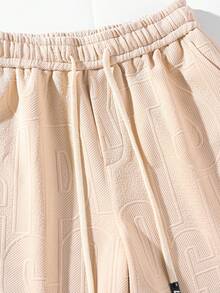 Blueprint Man 男士卡其色圆领加厚短袖短裤套装，3D字母压纹，透气吸汗，抗起球，防皱易打理，时尚休闲男士两件套，短袖短裤套装，适合日常休闲、朋友聚会等场合，尽显老钱风范。 - 卡其色 - 查看 6