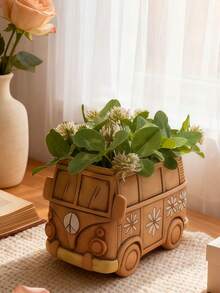 这款专为植物爱好者设计的创新树脂花盆，既可作为小型多肉植物的实用花盆，又可作为装饰品，是点缀桌面或家居花园的理想之选。花盆采用耐用树脂制成，兼具实用性和美观性，为植物爱好者提供了一种时尚的方式来展示室内绿植，同时为任何生活空间增添一丝自然优雅的气息。 - 彩色 - 查看 8