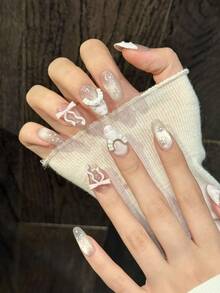 10片甜美粉色渐变3D蝴蝶结仿珍珠法式手工亚克力美甲贴片，可爱波点裙摆图案，短款椭圆法式美甲贴片，DIY美甲用品，可重复使用，附赠果冻胶和指甲锉，适合日常佩戴、情人节、音乐节派对、婚礼新娘等场合。 - 淺粉色 - 查看 3