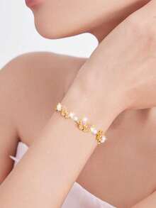 1条S925纯银粉色珐琅镀金蝴蝶珍珠手链，优雅奢华，适合派对、送礼、婚礼、日常佩戴，配有精美礼盒，是生日、圣诞节、母亲节的理想之选。