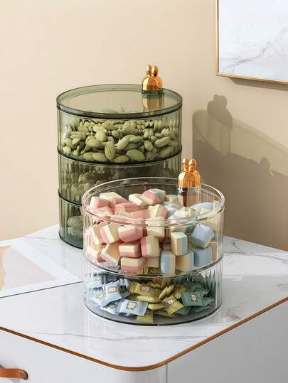 1pc Rotating Candy Box Rotating Design Double-Layer Surprise, Three-Layer Luxury, Layered Storage Of Candy, Nuts, Dried Fruit, Classification Clear And Not String Flavor. The Sealed Lid Is Designed To Lock Fresh And Moisture-Proof, Allowing Delicious Lasting Online.
