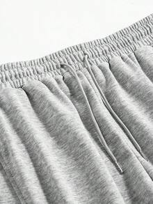 Quần ống rộng dáng suông màu xám nhạt dành cho nam, thiết kế đơn sắc với dây rút ở eo, được làm từ chất liệu polyester, thích hợp cho trang phục thường ngày, đi chơi và chơi thể thao vào mùa xuân và mùa hè. - Xám - Xem 3