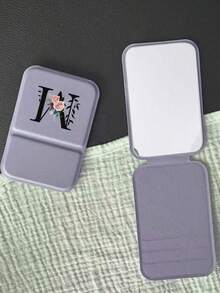 Gương trang điểm mini gấp gọn màu tím, chữ cái đầu màu đen, họa tiết hoa màu hồng, gương trang điểm chữ cái A-Z có giá đỡ, gương du lịch màu tím, sản phẩm làm đẹp, gương trang điểm để bàn, gương hình chữ nhật để bàn nhỏ gọn, gương trang điểm tối giản nhỏ gọn, gương trang điểm du lịch xách tay làm quà tặng cho phụ nữ - Món quà tuyệt vời nhất cho giáo viên, mùa tựu trường, đồ dùng ký túc xá, món quà hoàn hảo, quà tặng Giáng sinh, quà tặng Halloween - Nhiều màu - Xem 5