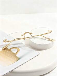 一副轻便无框时尚眼镜，金属框和PC框可选，适合日常通勤。适合长时间使用电脑、手机、屏幕，也可作为配饰佩戴。 - 透明片 - 查看 12