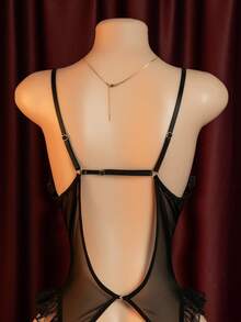 性感连体睡衣，采用透视网纱蕾丝贴花和镂空细节设计，深V领，荷叶边装饰，露背款式。 - 黑色 - 查看 5