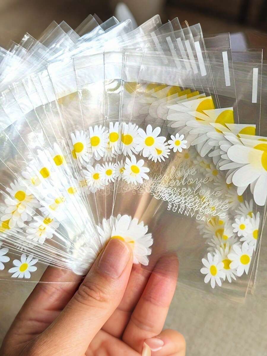 100个烘焙袋，自粘半透明雏菊花袋，DIY礼品卡装饰袋，“晴天”印花OPP袋，适用于派对、生日、婚礼和礼品包装，也适用于珠宝包装、情人节礼物、春季礼物和新年礼物包装
