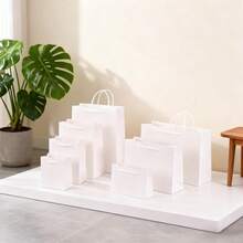 1/5/10 weiße 5.9 * 5.12 Inch Papier Geschenktüte mit Griff, einfache, Einfarbig quadratische, strapazierfähige Party Geschenktüte, geeignet für Einkaufen, Junggesellenabschied, Hochzeit, Junggesellinnenabschied, Partydekoration, Geburtstagsfeier, Brautjungfern Einladungsgeschenk, Hochzeitsdekoration, Hochzeitsbankett, Junggesellinnenparty und andere Anlässe.