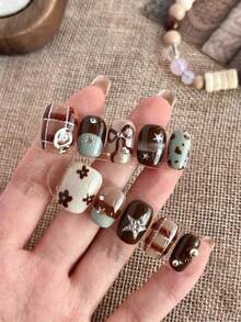 Bộ 10 miếng dán móng tay vuông ngắn - Màu nâu caramel và xanh bạc hà, trang trí họa tiết kẻ caro, nơ 3D, hoa văn và đá ngôi sao | Móng giả bóng bẩy, phong cách retro ngọt ngào + Bao gồm gel dán và dũa móng, phù hợp cho sử dụng hàng ngày/tiệc tùng/thường ngày. - Follow Your Heart - Xem 2