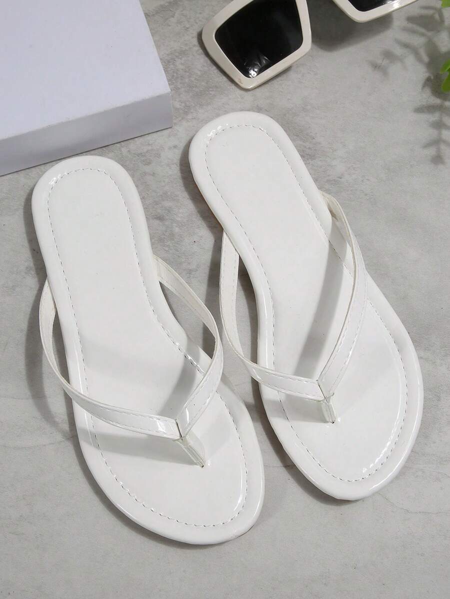 Dép xỏ ngón bóng mượt cho nữ, dép xăng đan mùa hè phong cách đường phố thường ngày, dép đế bằng màu đen đa năng chống trơn trượt, dép đi trong nhà.