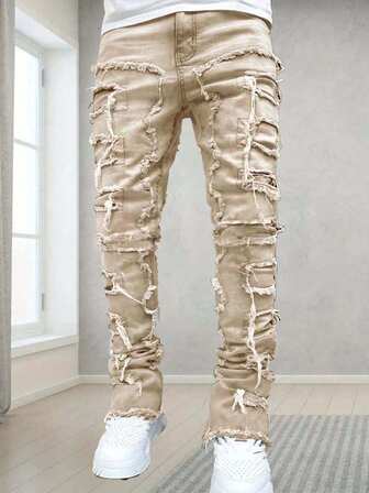 青少年男童拼接毛边休闲牛仔裤