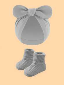 2件套婴儿柔软蝴蝶结印花头巾帽+针织袜套装，舒适发带帽，可爱时尚，适合0-6个月宝宝四季佩戴，是绝佳的生日礼物。 - 彩色 - 查看 13