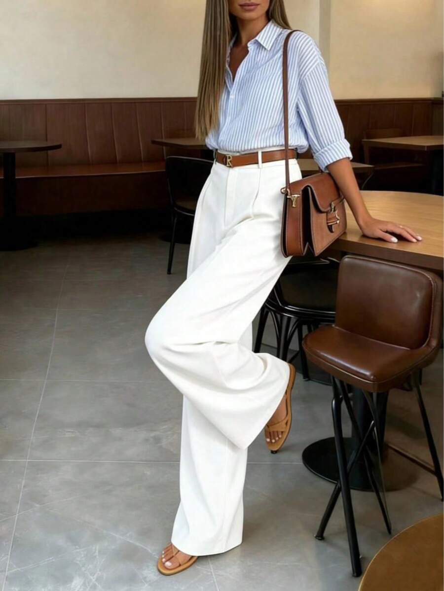 Spodnie damskie w stylu retro z wysokim stanem, luźne, ale dopasowane, doskonale się układają, odpowiednie do noszenia w biurze, lekki materiał na wiosnę i lato.