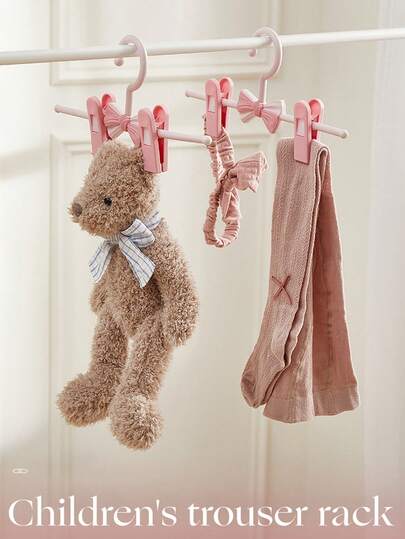 5 piezas Pinzas ajustables de plástico para colgar pantalones con moño - Adecuado para ropa de niños, material sin procesar antideslizante, pinzas ajustables y expandibles para colgar pantalones para niños y uso doméstico, esencial para la lavandería, percha ajustable para niños, almacenamiento expandible para pantalones