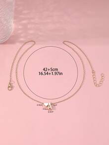 简约字母金色爱心吊坠项链，送给家人和朋友的完美礼物