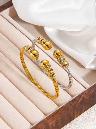 优雅扭纹串珠手链，镶嵌合成锆石，不锈钢材质，适合日常佩戴和派对场合。