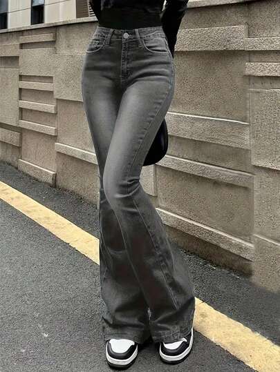 Tonårsflicka Trendiga Tvättade Vintage Utsvängda Jeans