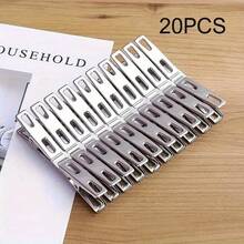 不锈钢衣夹，防风防掉落设计，配有袜子夹。室内外均可使用。可搭配衣架晾晒衣物，防止衣物被风吹走或滑落。完美的圣诞礼物——理想的送礼佳品。