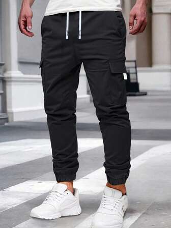 1件青少年男童简约前系带口袋工装裤，休闲日常穿着