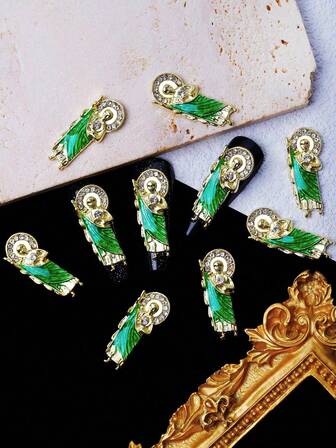 10 st/förpackning smaragdgrön strass guldlegering stående figur religiös stil nagelkonst dekorativa tillbehör, lyxiga och moderiktiga gör-det-själv nagelkonst tillbehör, oparfymerade och kombinerbara 3D-nagelprodukter, nagelberlock nagel ädelstenar, strass och dekorationer.