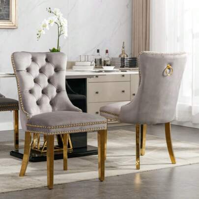High-End Modern Dining Chair, Nikki Collection By A&A Furniture, Upholstered In Velvet, With Gold-Plated Stainless Steel Legs And Stud Trim. Set Of 2. Gray And Gold Color. Model DE1601GY.